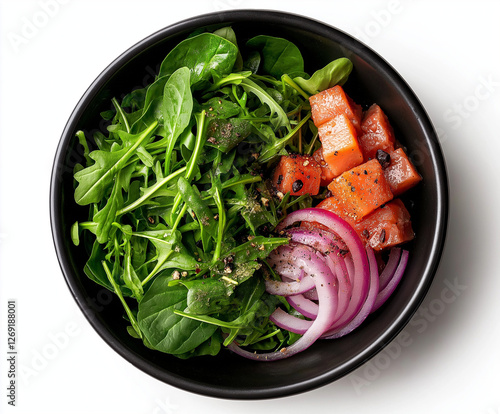 top view bowl , no background of; Baby spinach Rocket  Red onion  photo