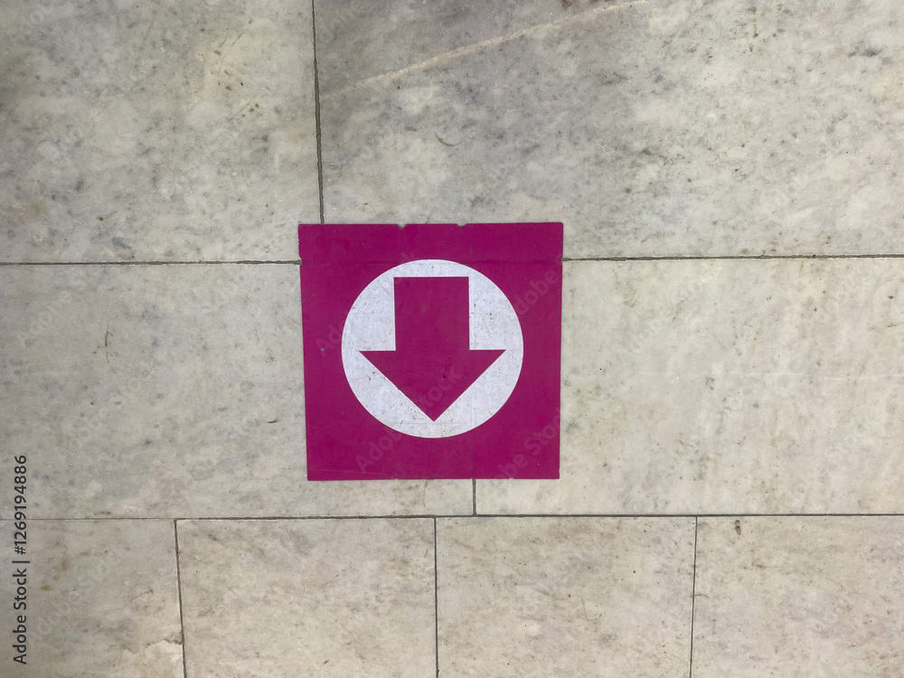 An arrow sign showing the direction to go forward An arrow sign showing the direction to go forward