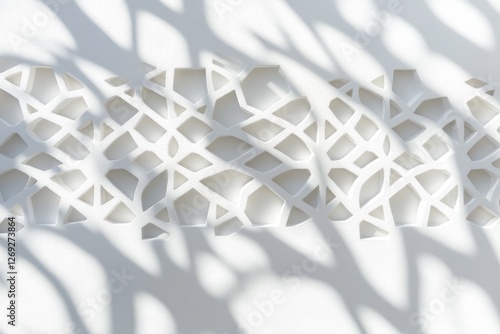 Fototapeta Naklejka Na Ścianę i Meble -  Decorative white wall pattern with plant shadows