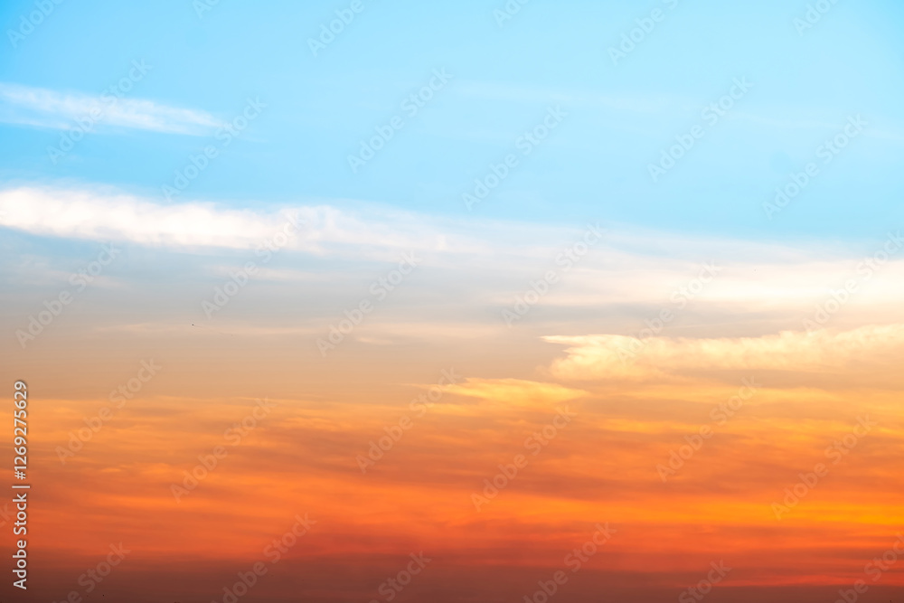 Beautiful , luxury soft gradient orange gold clouds and sunlight on the blue sky perfect for the background, take in evening,Twilight, Large size, high definition landscape photo Beautiful , luxury soft gradient orange gold clouds and sunlight on the blue sky perfect for the background, take in evening,Twilight, Large size, high definition landscape photo
