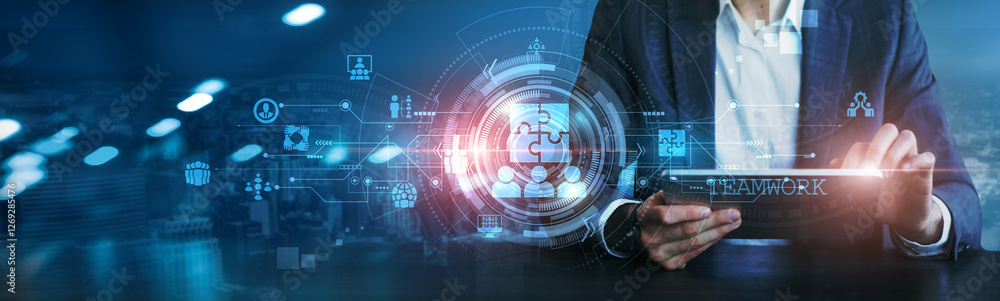 Teamwork. Businessman using a tablet to analyze teamwork strategies, market performance, business trends, collaborative efforts, operational efficiency, leadership initiatives, productivity measures.