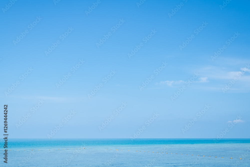 Beautiful seascape with blue sky on a sunny day. Nature background. Sea surface in sun light. Relaxing natural photo wallpaper. Teal blue ocean view. Breezy wavy seawater. Water background texture. Beautiful seascape with blue sky on a sunny day. Nature background. Sea surface in sun light. Relaxing natural photo wallpaper. Teal blue ocean view. Breezy wavy seawater. Water background texture.