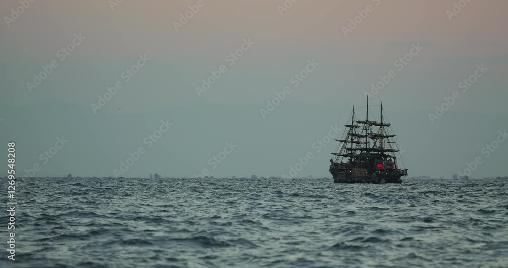 Pirate ship sailing on the ocean Pirate ship sailing on the ocean