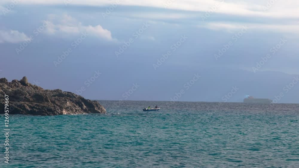 fishermen in a boat, fishing, boat with fishermen in the sea, a large container ship sails past, everyday hard work
Fisherman fishermen in a boat, fishing, boat with fishermen in the sea, a large container ship sails past, everyday hard work
Fisherman