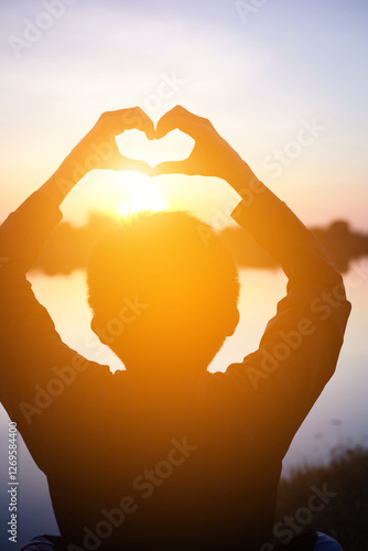 boy hands holding hearts silhouette	