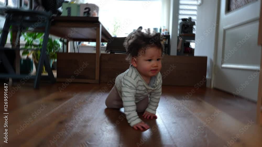 Baby boy crawling on the floor towards the camera. Baby development concept. Baby boy crawling on the floor towards the camera. Baby development concept.