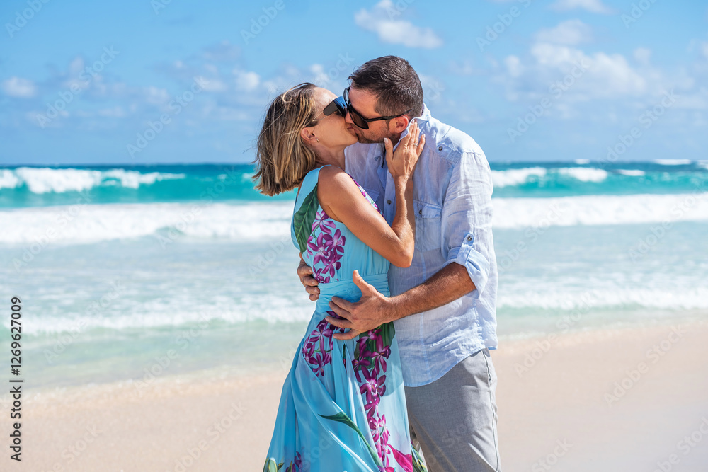 Beautiful people kissing on a beautiful beach Beautiful people kissing on a beautiful beach