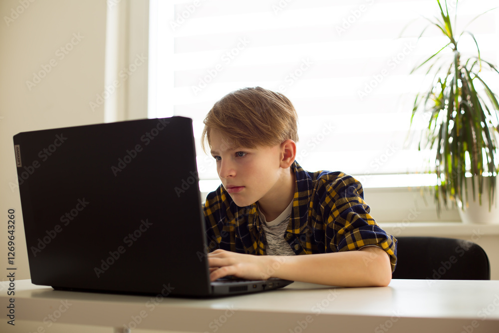 Teenager Staring at Computer Screen Concept of Technology Addiction Teenager Staring at Computer Screen Concept of Technology Addiction