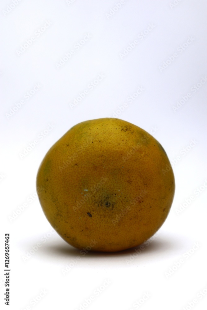 Close-up of a Fresh, Organic Mandarin Orange against a White Background Close-up of a Fresh, Organic Mandarin Orange against a White Background