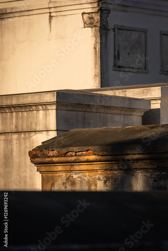 Grave Sites and Mausoleums at St Louis Cemetery No. 1 in New Orleans on a sunny Day; Close-up with Copy Space photo