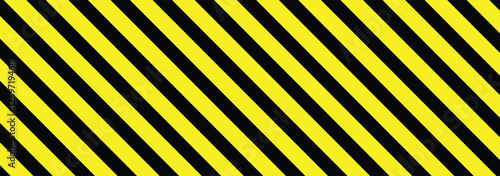 Warning yellow black diagonal stripes line. Stripe caution hazard, danger road sign. Safety stripe warning caution hazard danger road vector sign symbol. Symbol of hazardous and radioactive substances
