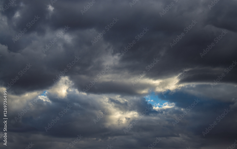 storm clouds at sunset storm clouds at sunset