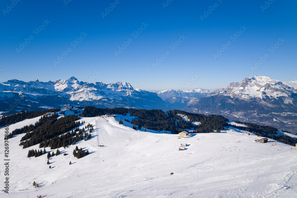 The ski slope in Megeve in Europe, France, Auvergne Rhone Alpes, Haute Savoie, Megeve, in summer, on a sunny day. The ski slope in Megeve in Europe, France, Auvergne Rhone Alpes, Haute Savoie, Megeve, in summer, on a sunny day.
