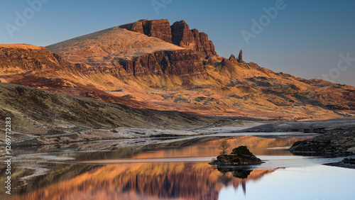 Loch Fada and The Old Man of Storr at sunrise on the Isle of Skye, Scotland. photo