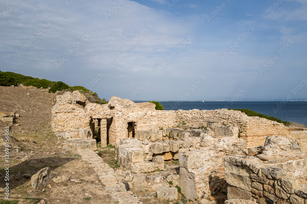 The archaeological site of Tharros in Cabras in Europe, Italy, Sardinia, Cabras, in summer, on a sunny day. The archaeological site of Tharros in Cabras in Europe, Italy, Sardinia, Cabras, in summer, on a sunny day.