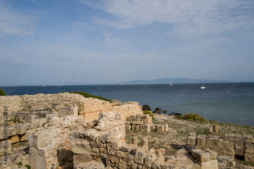 The archaeological site of Tharros in Cabras in Europe, Italy, Sardinia, Cabras, in summer, on a sunny day. The archaeological site of Tharros in Cabras in Europe, Italy, Sardinia, Cabras, in summer, on a sunny day.
