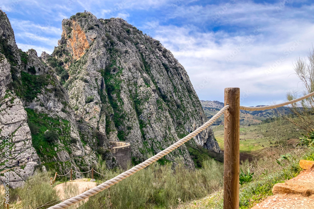 Fototapeta premium Hiking to Montejaque dam (Presa de Montejaque) and Hundidero cave (Cueva del Hundidero) in the province of Malaga, Andalusia, Spain
