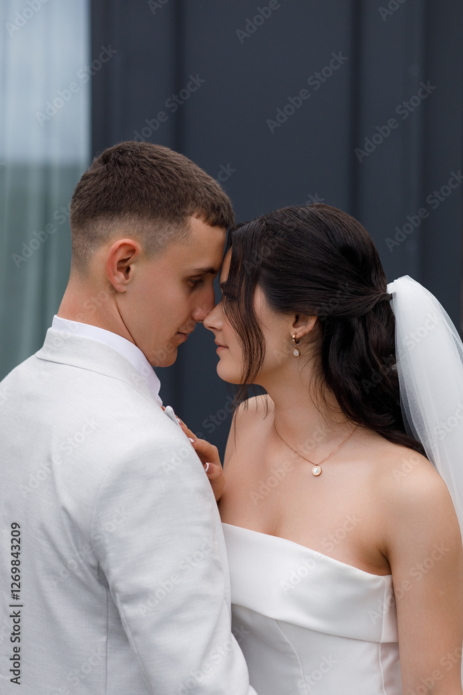 couple standing facing each other. couple standing facing each other.