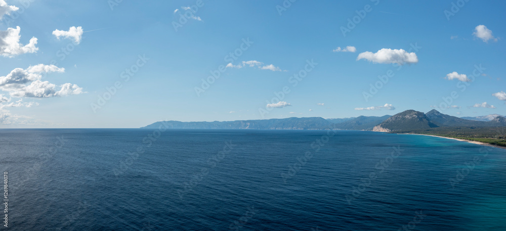 Obraz premium The panorama of the Mediterranean Sea in Orosei in Europe, Italy, Sardinia, Orosei, in summer, on a sunny day.