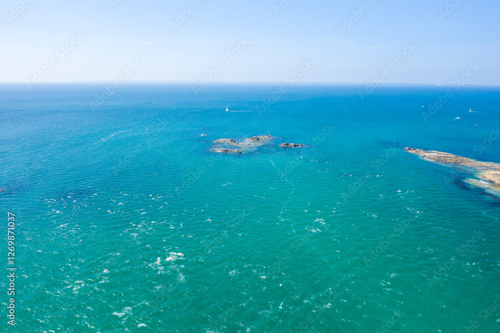 Obraz premium The tip of Conguel and the islet of Toul Bihan in Quiberon in Europe, France, Brittany, Morbihan, Quiberon, in summer, on a sunny day.