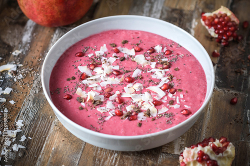 Pomegranate smoothie in the bowl 