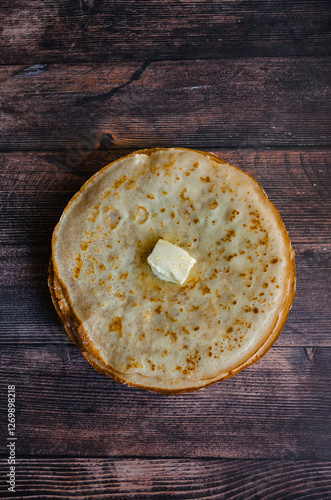 Russian pancakes with butter and honey. Pancakes for russian holiday Maslenitsa