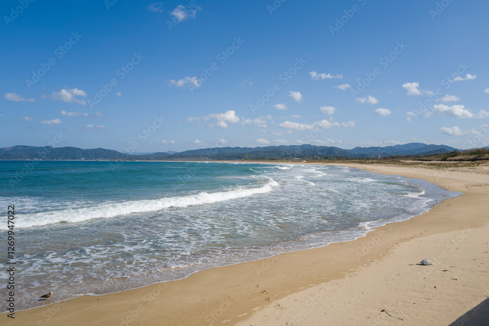 Shotenkyo Beach in Kumihamacho in Asia, Japan, Kansai, Kinosaki, in summer on a sunny day. Shotenkyo Beach in Kumihamacho in Asia, Japan, Kansai, Kinosaki, in summer on a sunny day.