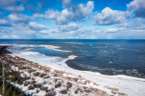 Aerial landscape of Baltic Sea beach in Mikoszewo at snowy winter. Poland photo