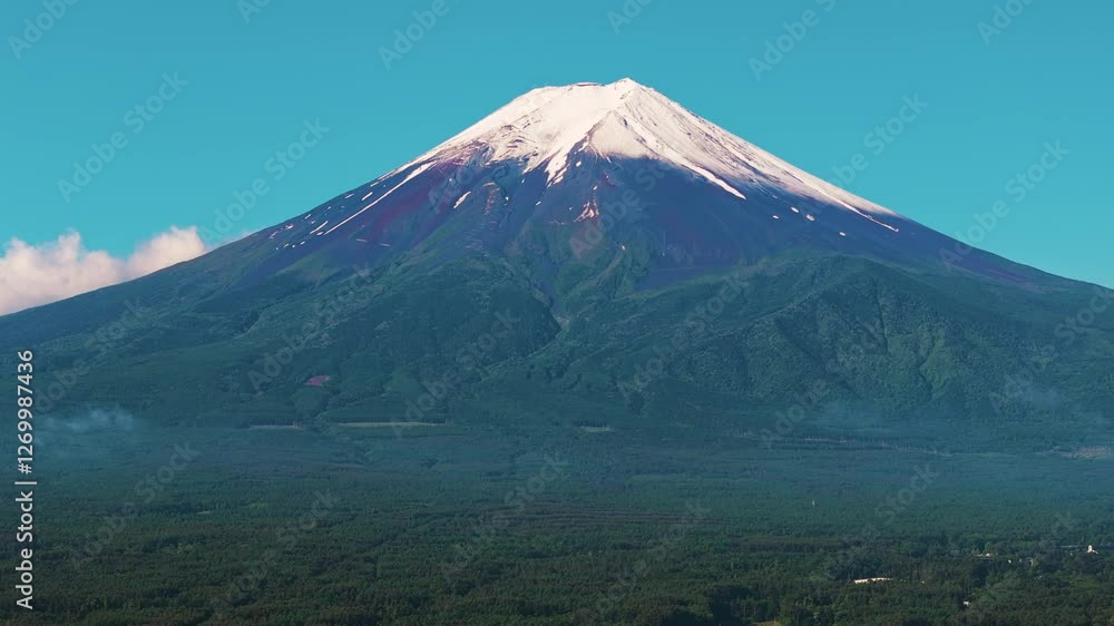 Aerial landscape of Kawaguchiko town and Mount Fuji in the distance Aerial landscape of Kawaguchiko town and Mount Fuji in the distance