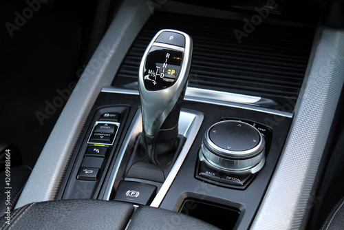 Automatic transmission gearshift stick, Closeup a manual shift of modern car gear shifter. Close up of the automatic gearbox lever, black interior car.