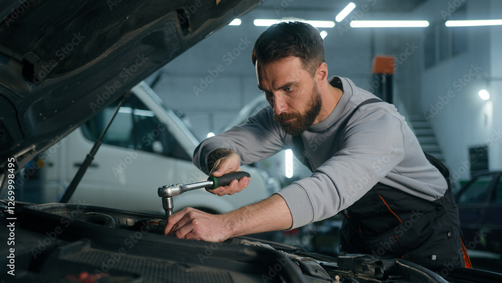 Professional auto mechanic engineer Caucasian man working in vehicle service engine specialist fixing motor automobile using spanner key wrench tool repair car broken truck in garage workshop station Professional auto mechanic engineer Caucasian man working in vehicle service engine specialist fixing motor automobile using spanner key wrench tool repair car broken truck in garage workshop station