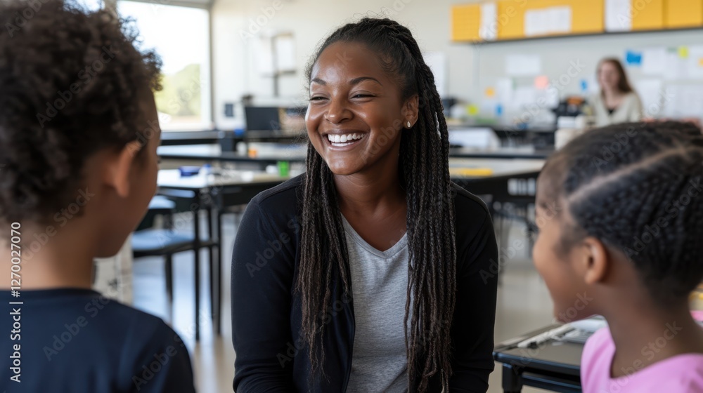 A teacher shares a joyful moment with students in a bright classroom, fostering an environment of learning, laughter, and connection. A teacher shares a joyful moment with students in a bright classroom, fostering an environment of learning, laughter, and connection.