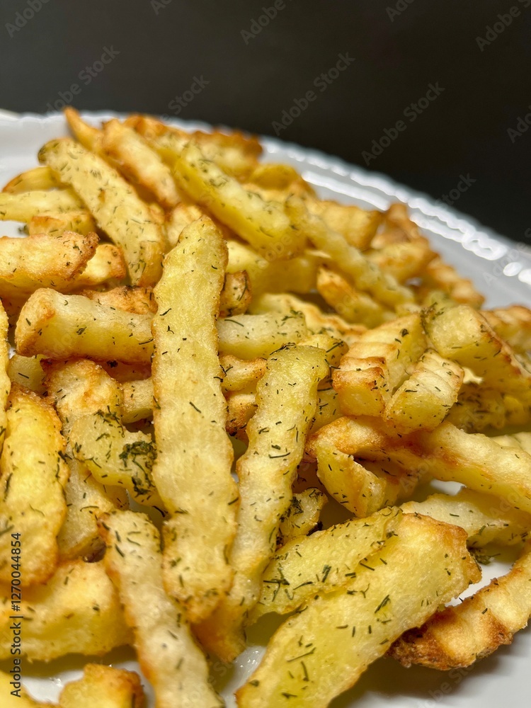 french fries on a white plate french fries on a white plate