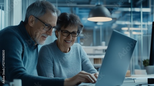 Old couples smiling as they sit in lawyers', agents', designers' offices look...