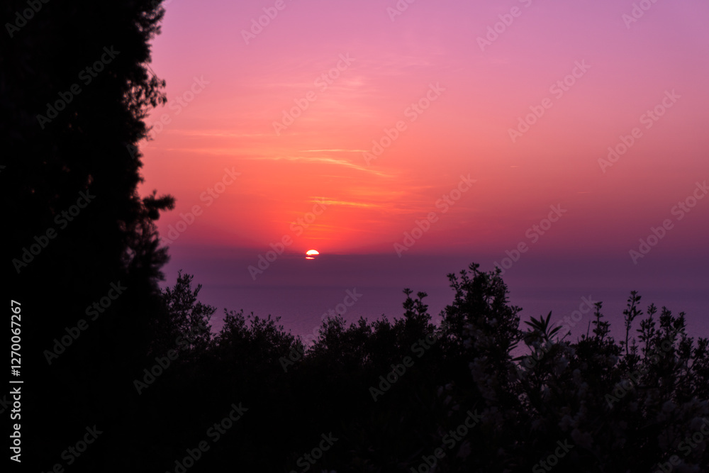 Fototapeta premium Beautiful sunset with the blue sea at Mirador de Sa Foradada, Mallorca, Balearic Islands, Spain.