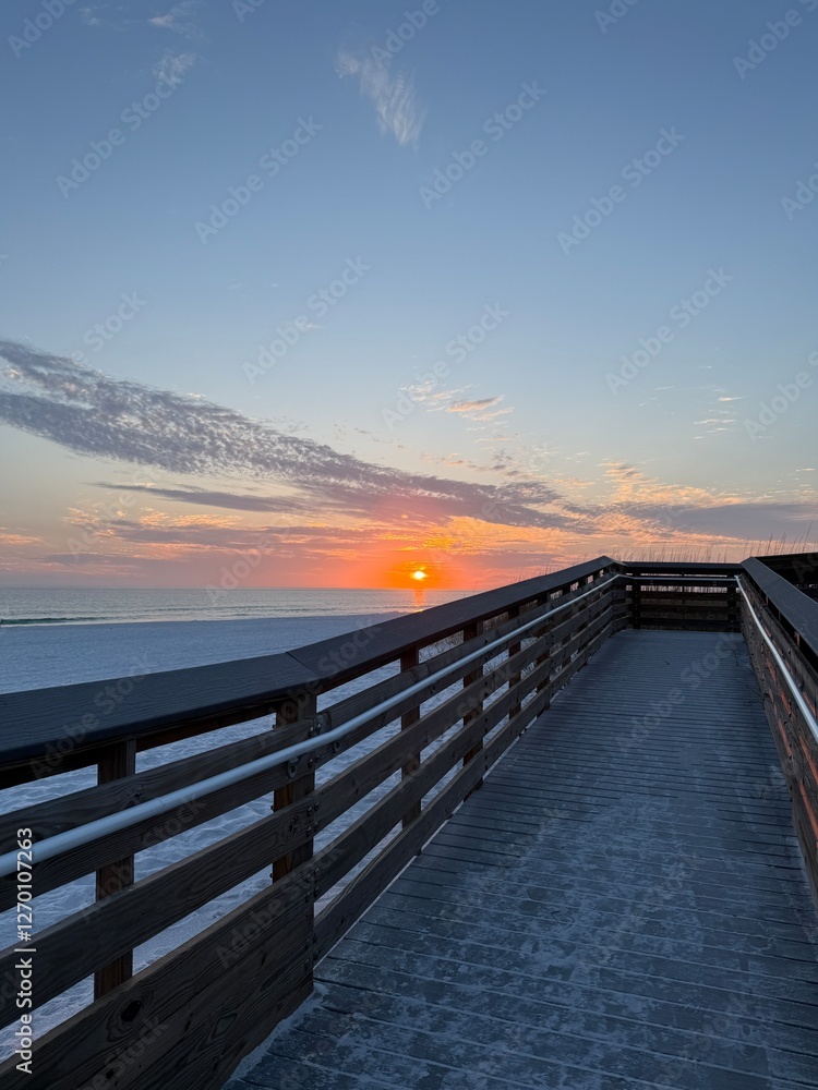 Obraz premium Miramar Beach Florida public beach access with sunset over the Gulf of Mexico 