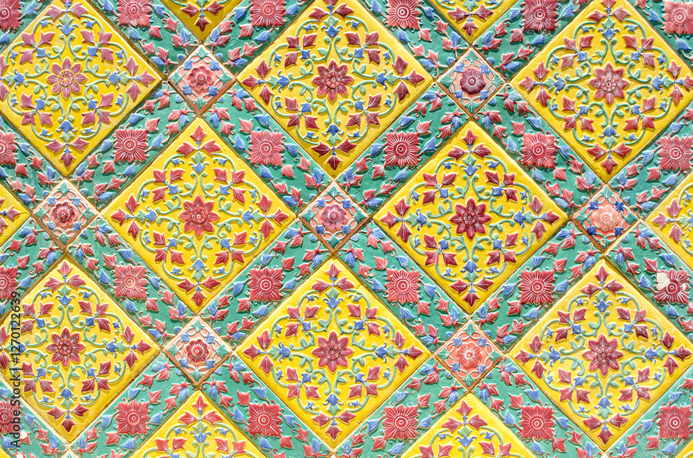 Colorful geometric patterned tile design Temple wall at wat ratchabophit Colorful geometric patterned tile design Temple wall at wat ratchabophit
