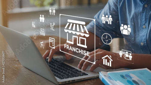 Man working on franchise opportunities using laptop computer
