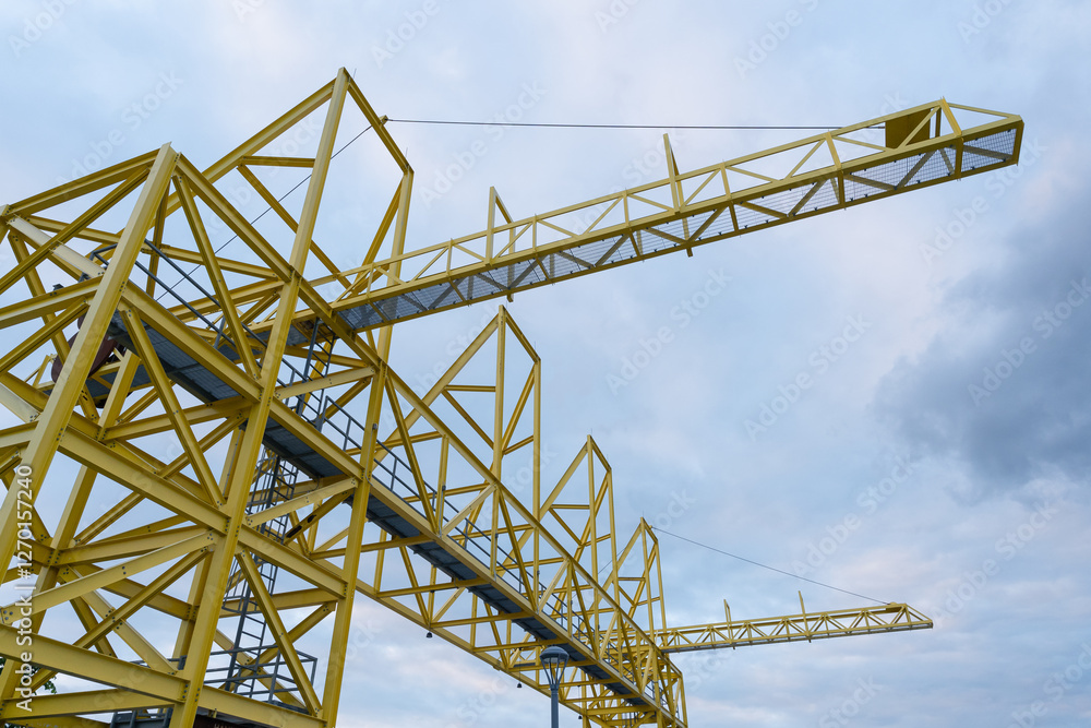 Large Yellow Gantry Crane Ready for Operations at an Industrial Port for Container and Cargo Handling Large Yellow Gantry Crane Ready for Operations at an Industrial Port for Container and Cargo Handling