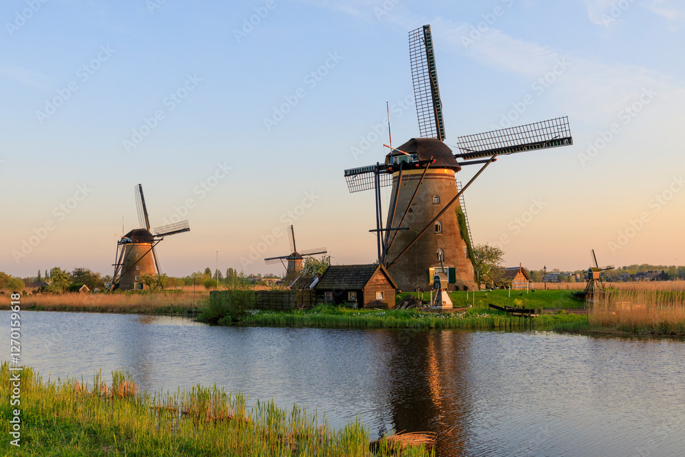 Naklejka premium Europe, The Netherlands, Holland. South Holland, Zuid Holland, Kinderdijk. Windmills.