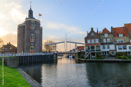 Obraz na płótnie Europe, The Netherlands, North Holland. Enkhuizen. Town gate, harbor and bridge at evening time. w salonie
