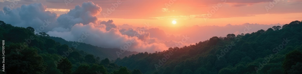 Fototapeta premium Clouds float above a tranquil forest at sunrise, calm, forest, serene