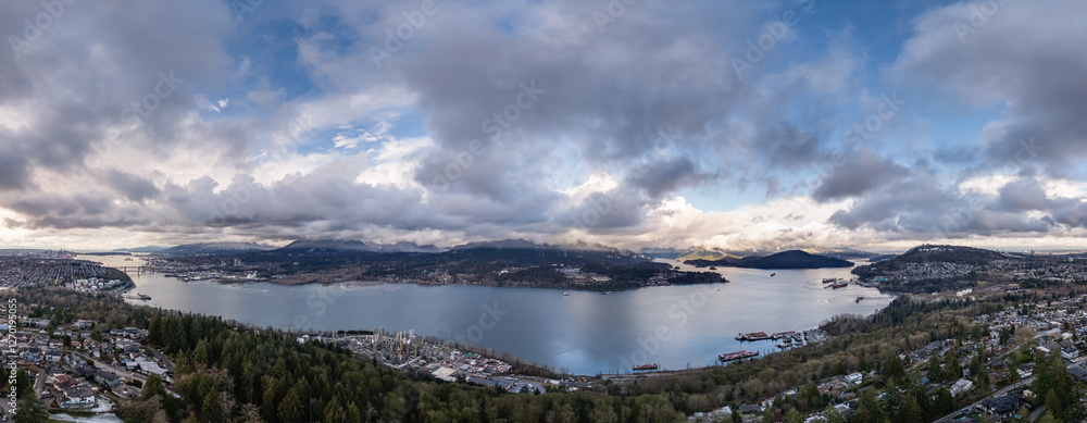 Panoramic View of Coastal Cityscape Surrounded by Mountains and Water Under Cloudy Sky Panoramic View of Coastal Cityscape Surrounded by Mountains and Water Under Cloudy Sky