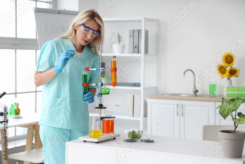 Female scientist with flask...