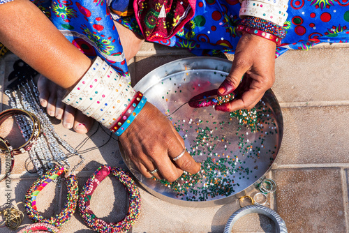 Obraz na płótnie South Asia, India, Republic of India. Traditional indian beading and jewelry being done by woman. w salonie