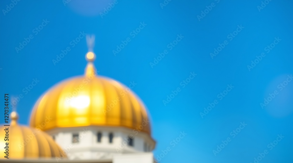Obraz premium Golden Dome Mosque Structure Blurred Against Clear Blue Sky