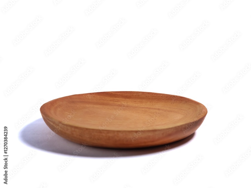 Brown empty round wooden plate isolated on white background Brown empty round wooden plate isolated on white background