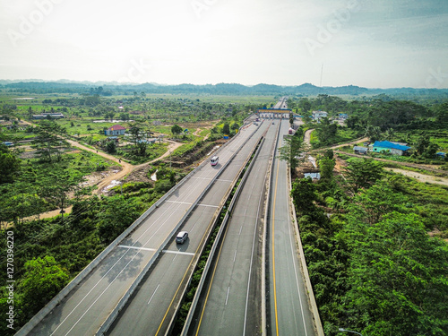 the view of the Balsam (Balikpapan - Samarinda) toll road connecting the cities of Samarinda and Balikpapan in the morning