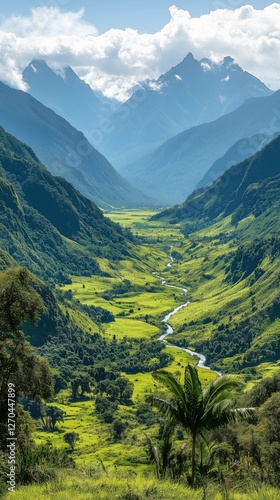 Breathtaking mountain valley with a winding river and lush greenery in bright...