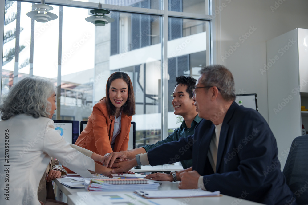 © crizzystudio - Diverse colleagues gathering hands together, showcasing strong teamwork and collaboration during a productive office meeting, embodying unity and support in a corporate environment